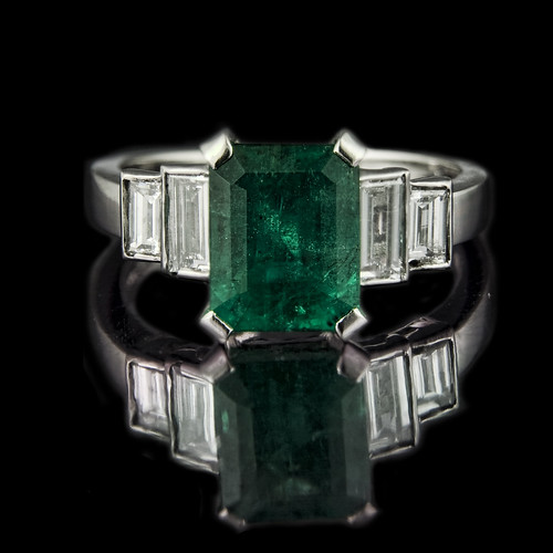 Emerald cut emerald engagement ring