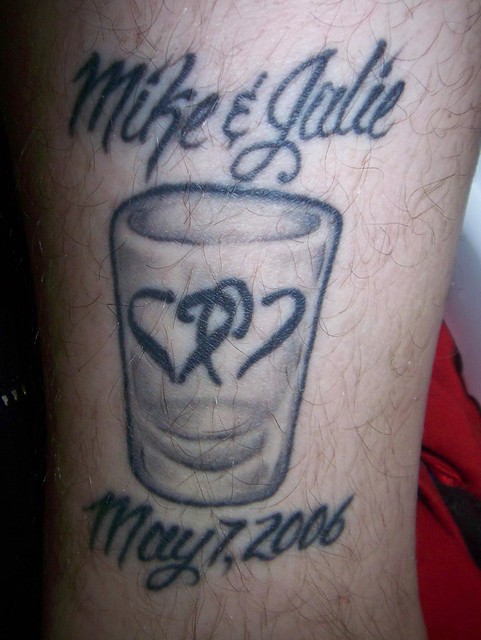 Wedding date and shotglass tattoo Mike Inside right ankle