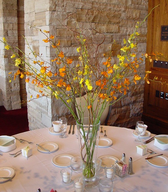  yellow oncidium orchids and curly willow branchesPerfect for a wedding 