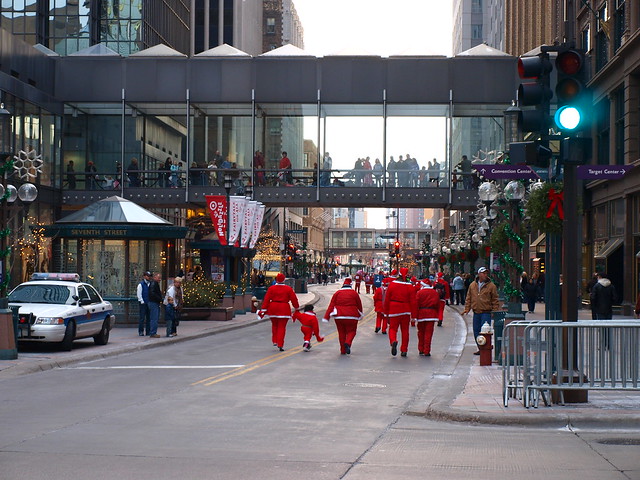 Legal Aid Santas down Nicollet Mall