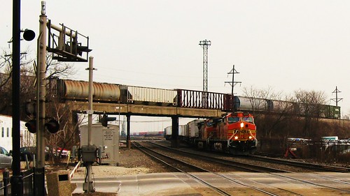 BNSF Railway intermodal switching movement passing underneath a westbound Canadian National freight train. Berwyn Illinois. February 2010. by Eddie from Chicago