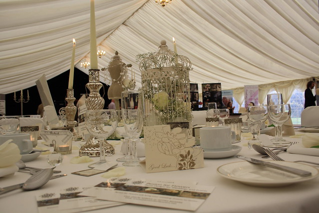 Vintage theme marquee weddding at Wroxall Abbey Floral Arrangements by 