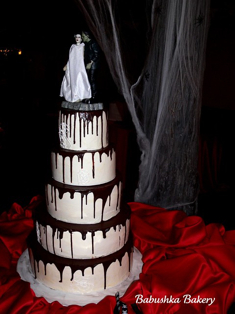 A delicious ganache dripping wedding cake 2 layers of Red Velvet with Cream 