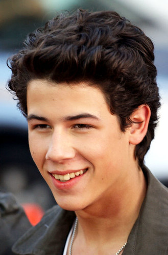 Nick Jonas Shows Teeth