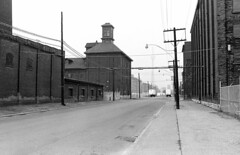 Historic photo from Wednesday, July 13, 1983 - Mill St looking west, from east of Trinity St. to the CN Tower in Distillery District