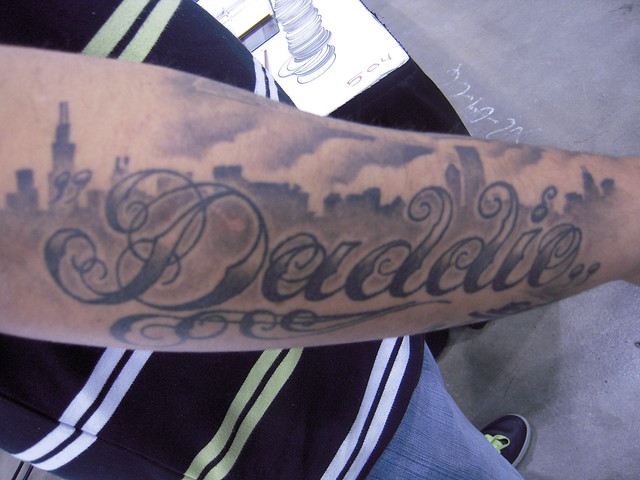 Michael Daddio has his name and the Chicago skyline on his right arm