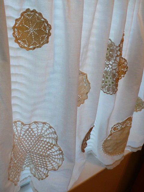 White curtains with doily appleque