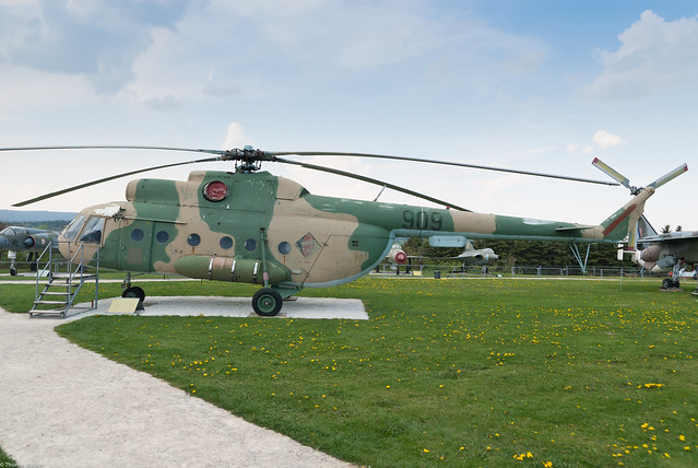 Nationale Volksarmee NVA Mil Mi8T 909 is parked on the green c n 10525