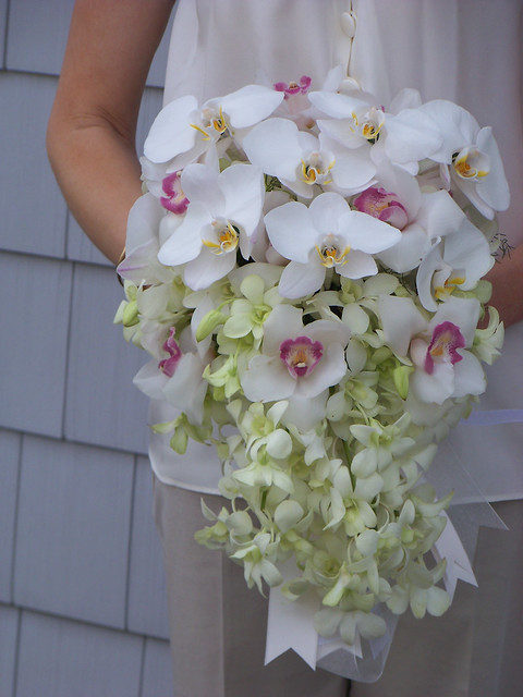 Cascading orchids wedding flower arrangements from Alan's Rumson Florist