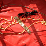 coral red vintage leather jacket+pearl necklace+gold watch+tom ford oversized sunglasses
