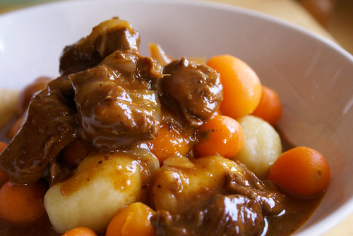 Beef stew with small potato dumplings and carrots