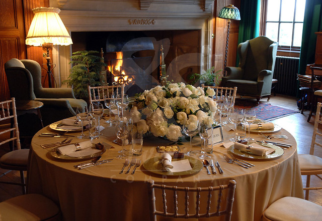 One of the beautiful tables at the wedding An ivory faux silk cloth looked 
