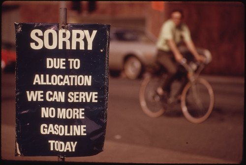 Oregon Still Had Scattered Gasoline Problems in May, 1974. A Downtown Station in Portland Shows a Sign Saying the Day's Allocation Is Sold Out. A Bicycler Uses an Alternate Method of Transportation 05/1974