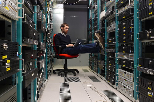 Man at work in a data center.