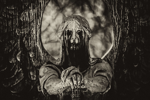 Used a antique plate filter by Nik to edit this HDR photo of a statue at