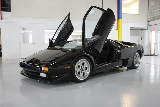 Black 1991 Lamborghini Diablo at the Grand Opening for Crystal Clean Auto 