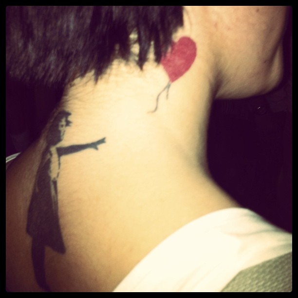 Banksy tattoo on a random girl I wonder if she didn 39t notice him doing it