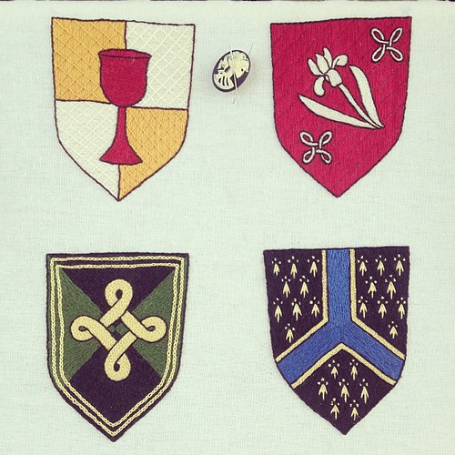All four finished baronial devices.