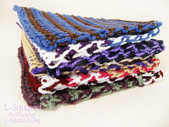 Striped scarf folded up to show all the colors on the edges.