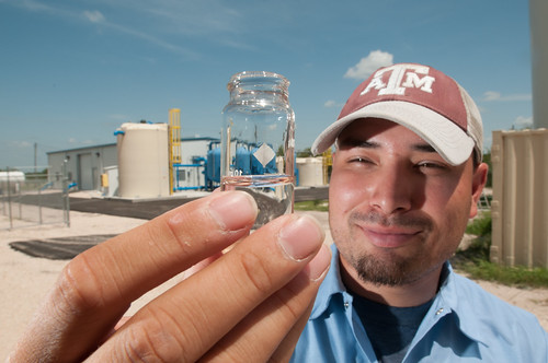 Anthony Arredondo takes a water sample at the Freer Water Control and Improvement District Arsenic Removal System Site in Freer, TX on Tuesday, June 18, 2013. USDA Photo by Lance Cheung.
