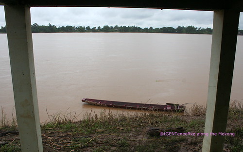 Lonely boat on the Mekong near BigSnake guesthouse by bigsnakeguesthousephonphisai
