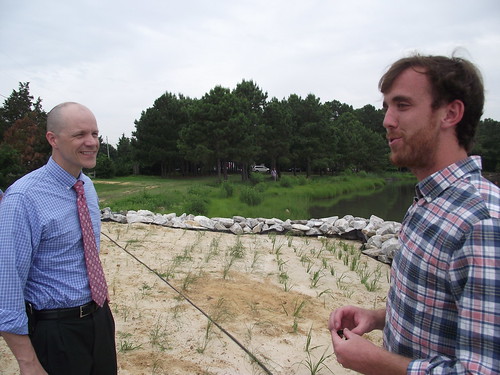 Restoration effort:  Acting USDA Under Secretary Doug O’Brien with Patrick Hudson, Operations Manager, True Chesapeake Oyster Company.  In the background is some of the shoreline restoration that USDA funding helped support. USDA photo.