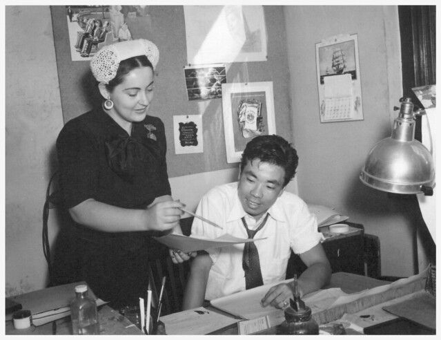 Ray Komai at work post WWII internment