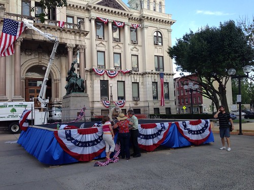 Erecting the stage, with bunting, for Jersey City mayoral inauguration