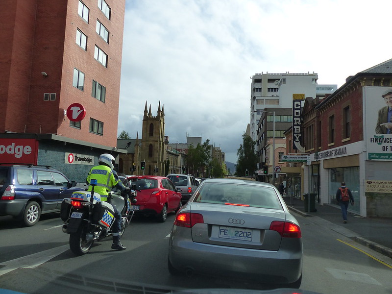 1 of 12: the excitment of a police bike in traffic