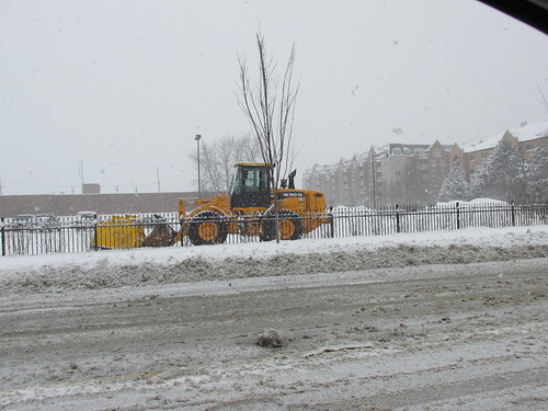 A heavy front end loader tractor leased for parking lot snow removal duty.  Norridge Illinois.  Thursday, January 2nd, 2013. by Eddie from Chicago