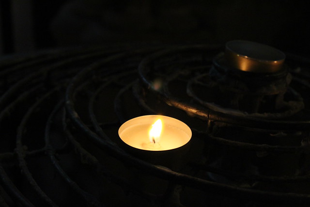 Erica lit this candle in memory of her father inside the Notre Dame