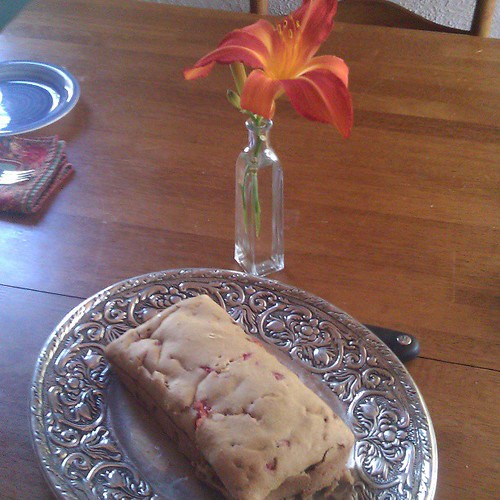 Lucas made strawberry bread sans recipe. He also set the table with matching cloth napkins and put a lily in a vase. I love this boy!
