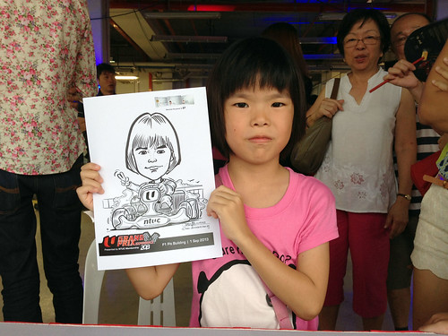 caricature live sketching for NTUC U Grand Prix Experience 2013 - 15