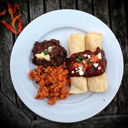 Mexican night at the OC #airbnb: butternut squash & feta mole enchiladas, refried black beans, Mexican rice.