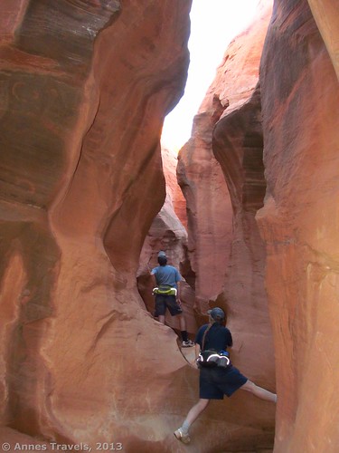 Climbing just above the arches in Peek-a-Boo Slot, Dry Fork Gulch, Grand Staircase-Escalante National Monument, Utah