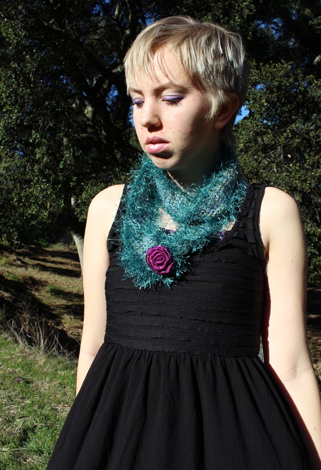 black ruffles on a babydoll tank top + teal scarf with purple rose brooch