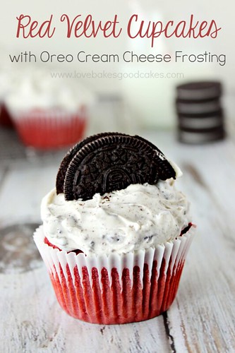 Red Velvet Cupcakes with OREO Cream Cheese Frosting close up with an OREO cookie.