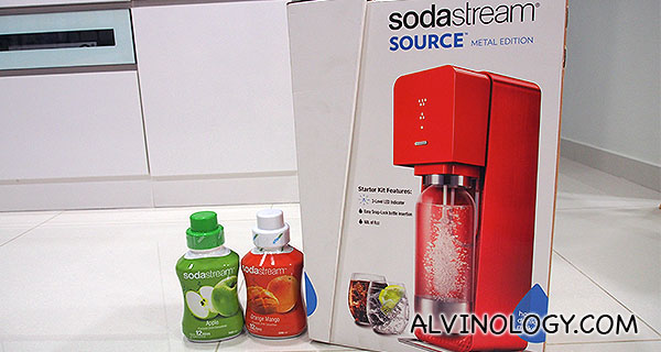 SodaStream Source and two bottles of syrup 