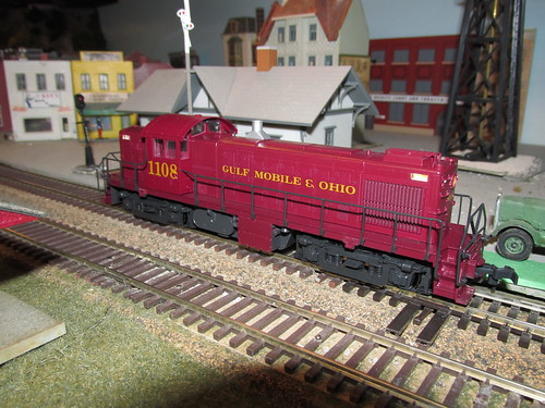 A Gulf, Mobile & Ohio Railroad Alco RS 1 roadswitcher passes the depot at Stocton. by Eddie from Chicago