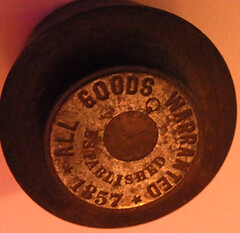 1857 All Goods Warranted die (reversed)