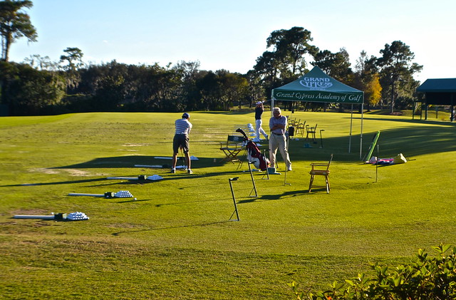 playing golf at villa grand cypress 