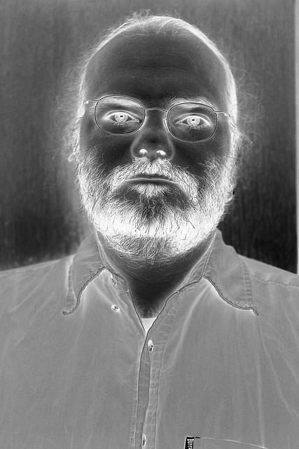 A black and white negative of a self portrait shot.