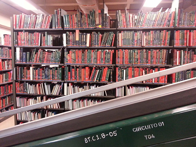 Books in basement with conveyor systen