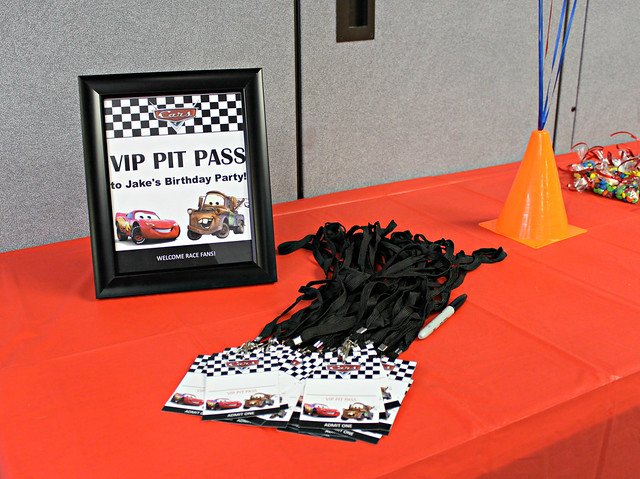 Welcome sign and pit pass name tags