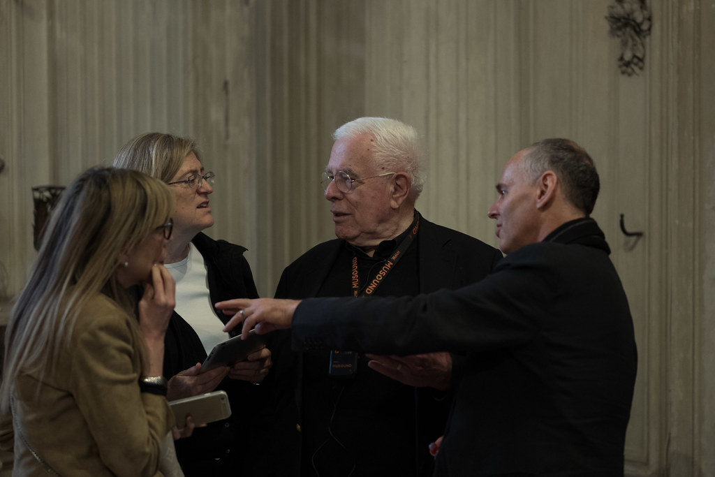 Peter Eisenman (B.Arch. ‘55), center, and Gale and Ira Drukier Dean of AAP Kent Kleinman, right, speak with guests at the Sala della Protomoteca.

photo / Don Randel, former Cornell provost