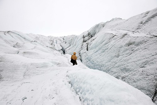 crossing crevasse on polar ice cap