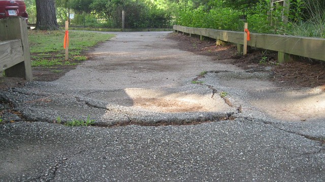 Cracked, damaged asphalt will be removed and replaced to smooth the trail