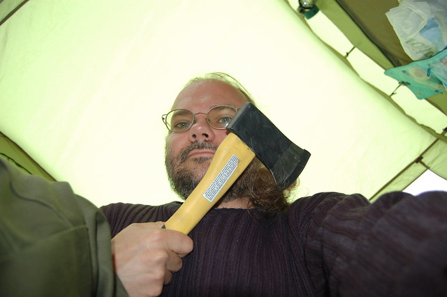 Wulf holding an axe and looking slightly scary