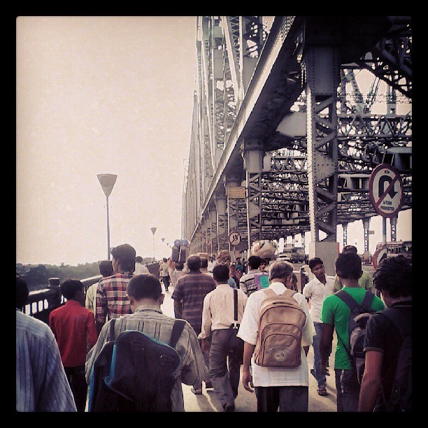 Pedestrian commuters crossing Howrah Bridge, the busiest in the world.