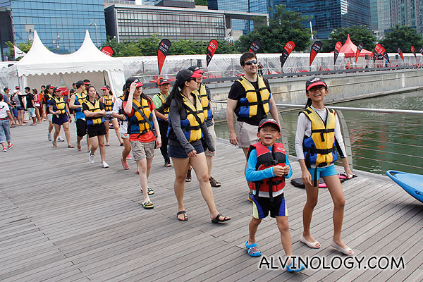 Happy group, heading off to try out canoeing on Marina Bay 